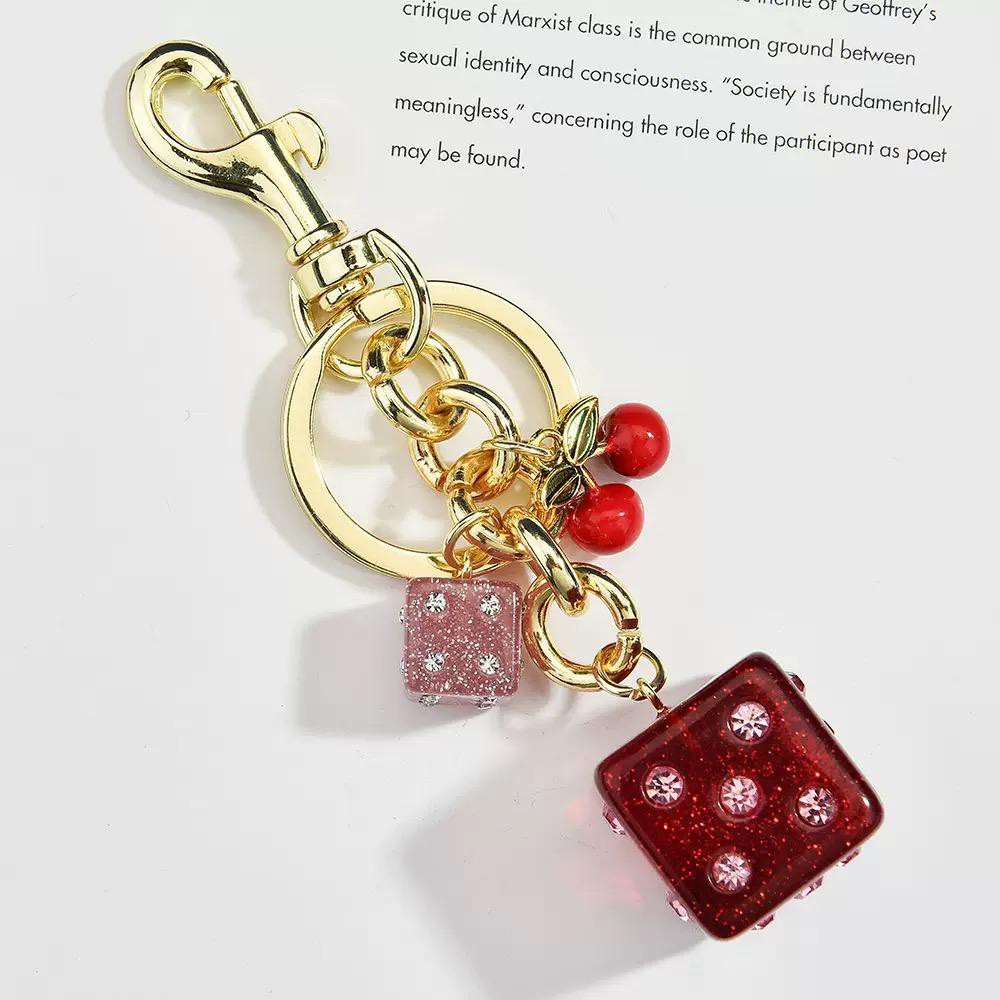 Dice bag charm keychain for handbags backpacks souvenirs and promotional gifts Dice bag charm keychain for handbags backpacks souvenirs and promotional gifts