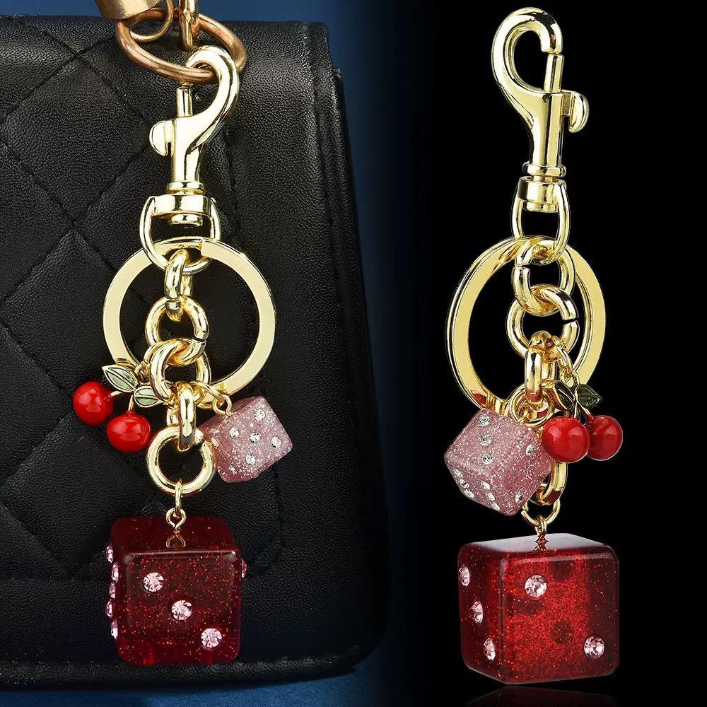 Wholesale dice bag charm keychains inspected before promotional gift shipment Wholesale dice bag charm keychains inspected before promotional gift shipment