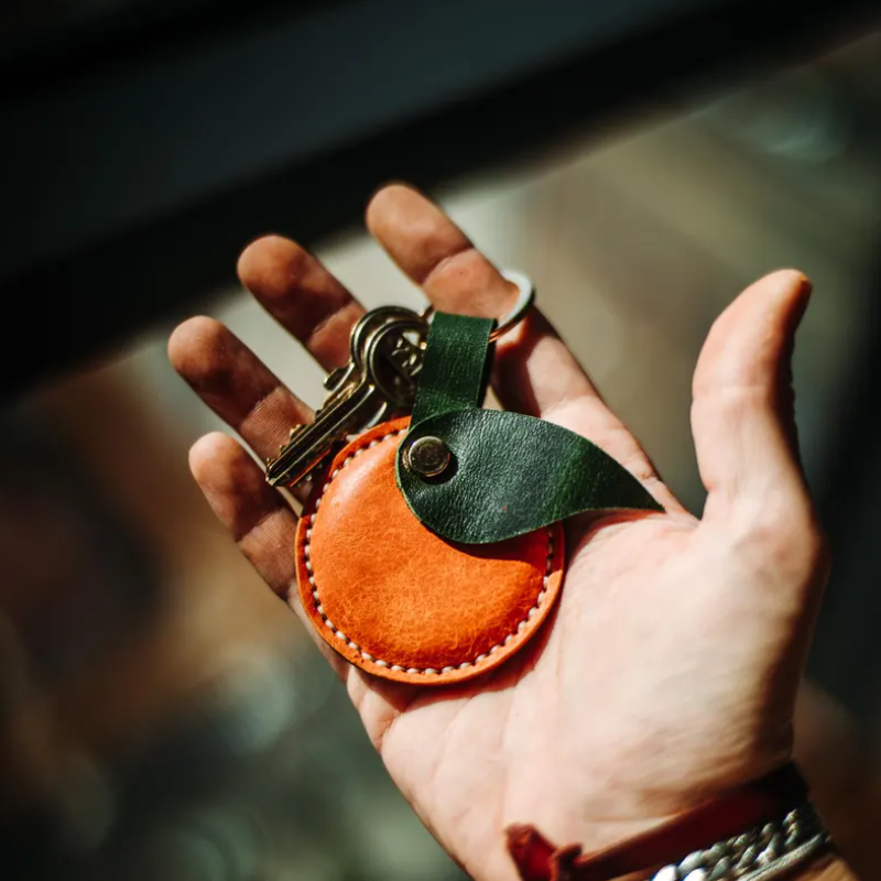 Leather orange keychain bag charm pendant for handbags backpacks and gift orders Leather orange keychain bag charm pendant for handbags backpacks and gift orders