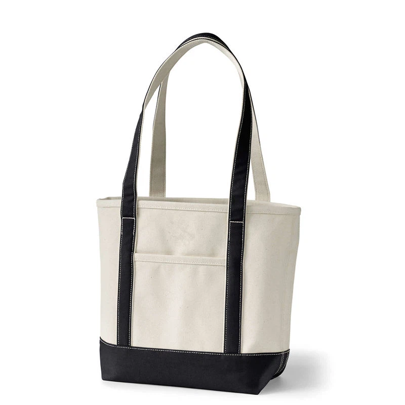 Heavy cotton canvas tote bag with front pocket zipper closure and long shoulder straps Heavy cotton canvas tote bag with front pocket zipper closure and long shoulder straps