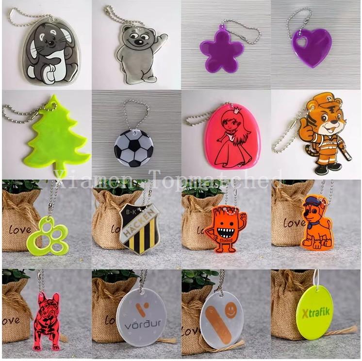 Custom screen printed eco friendly PVC reflector pendant fitted with durable color-matched ball chain Custom screen printed eco friendly PVC reflector pendant fitted with durable color-matched ball chain