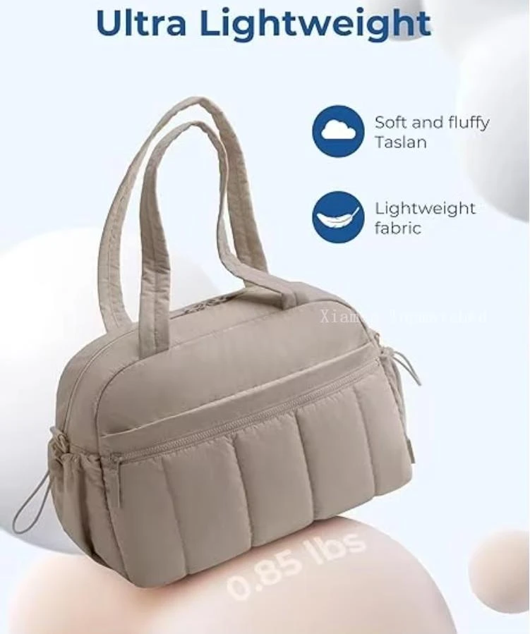 Puffer gym bag for women with large capacity zipper closure and padded shoulder strap
