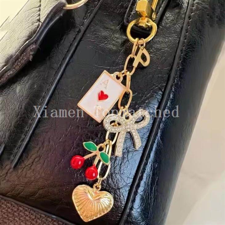 luxury-poker-card-and-cherry-bag-charm-hardware